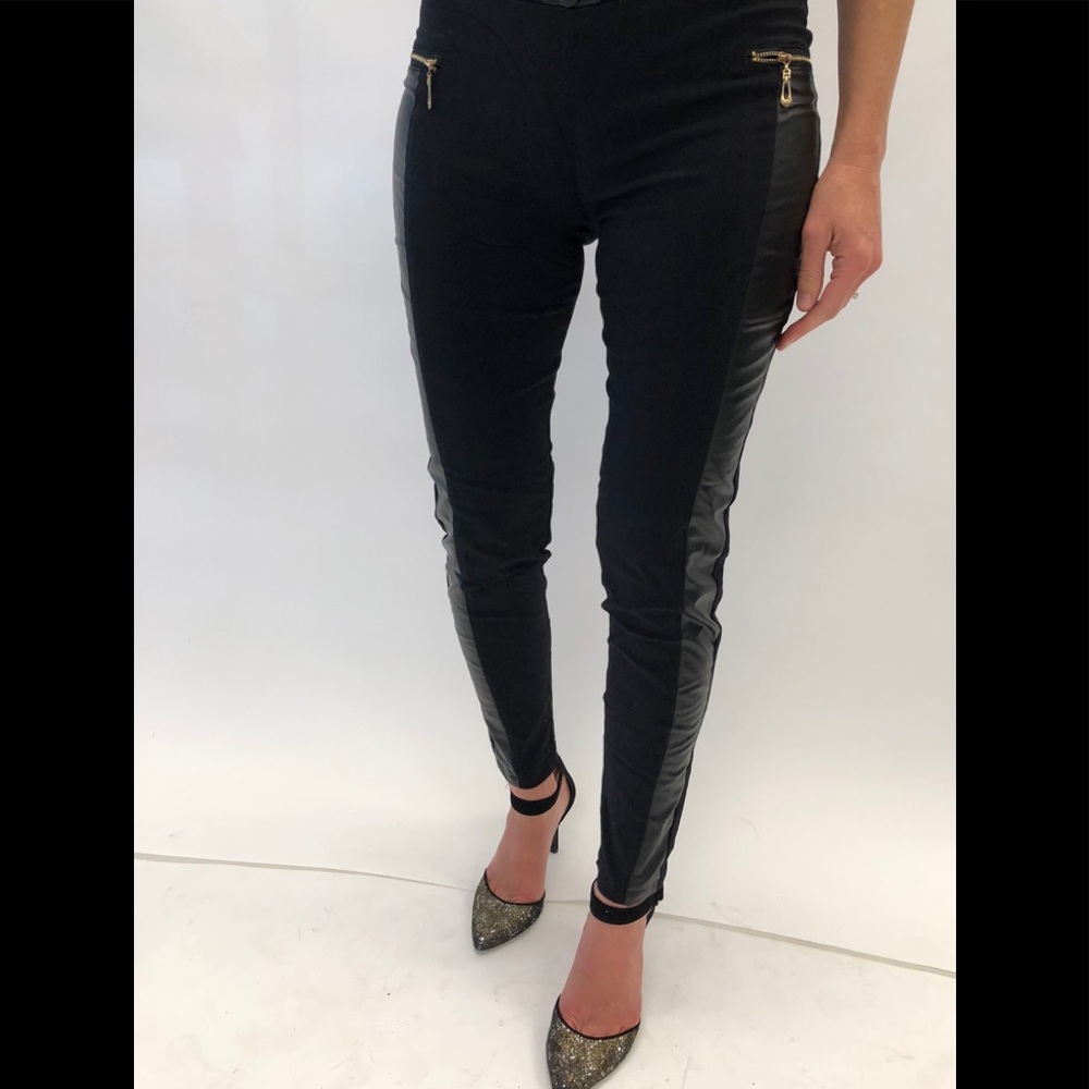 Black skinny pants. Pleather strips/gold zippers